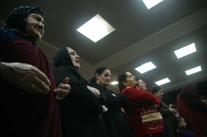 Iraqis pray at mass observed in office complex in Erbil converted to house about 350 families. (Morning Star News)