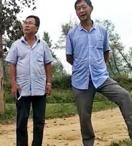 Liu Zigeng (left) threatened to kill a Christian family whose land he and others had seized, according to China Aid Association. (China Aid)