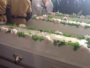 Caskets of three Christians slain by Islamic extremist suicide bombing at funeral at St. Rita's Catholic Church, Kaduna, Nigeria on Nov. 8.