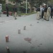 Police inspect site where Christian worker Birgitta Almby was shot in Lahore by suspected Islamic extremists.