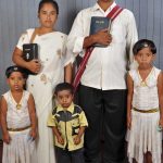 Pastor Mallik Arjun, beaten by Hindu extremists in Karnataka, India, and his family.