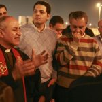 Clergymen and fellow Christians prayed and sang outside Cairo’s airport after Atallah's body arrived Tuesday night (March 12). (Morning Star News photo)