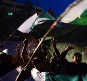 Pakistan's flag amid demonstrations. (Morning Star News file photo)