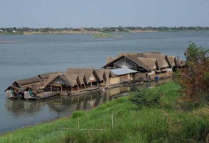 Floating restaurant on the Mekong River, Savannakhet, Laos. (Morning Star News via Wikipedia)