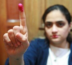 Finger dipped in ink indicating Egyptian woman has voted. (Morning Star News)