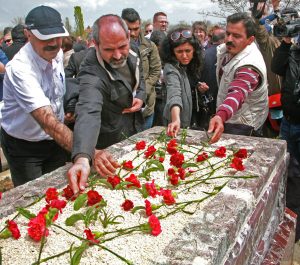 Turkish Christians at gravesite of Uğur Yüksel, April 18. (Morning Star News)
