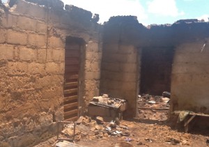 Charred home of the slain Gideon Mutang Kidum. (Morning Star News)