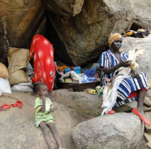 Thousands of Nuba Mountain civilians have taken from government bombing in caves (Diocese of El Obeid photo)