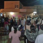 Members of Khartoum Bahri Evangelical Church watch, pray and worship at disputed property. (Morning Star News)