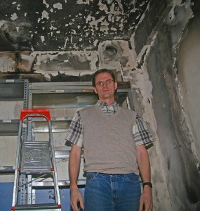 David Byle amid fire damage at Bible Correspondence Course in Turkey