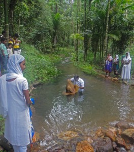 Baptism of a convert to Christianity at an undisclosed viillage in India. (Christian Aid Mission)