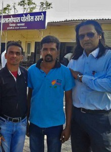 Pramod Sahu (center) was attacked at his workplace. (Morning Star News)