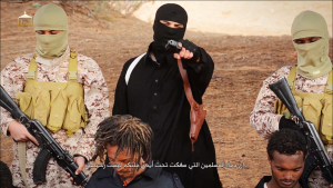 Islamic State representative in Libya addresses viewers in video. (Screen-save Morning Star News)