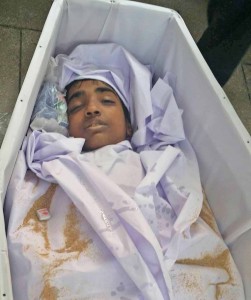 The body of Nauman Masih, 14, at his funeral. (The Voice Society)