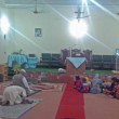 Christians look on as Muslims carry out ritual prayer after council meeting over blasphemy accusation in church building. (Morning Star News)