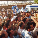 Mourners carry away casket at funeral for four Copts on July 7, 2013. (Morning Star News)