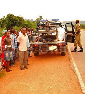 Police collect the body of Ismail Kuloba. (Morning Star News)