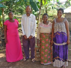 Pastor Amos Lukanula, his wife and church members in Zanzibar. (Morning Star News)
