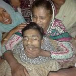 Arsalan Mushtaq's mother mourns over his body. (Morning Star News courtesy of attorney)