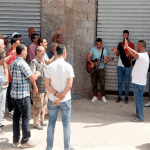 Members of church in Riki, Algeria worship outside building. (Morning Star News)
