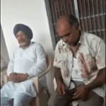 Pastor Mathai Varghese at police station after beating, kidnapping in Rajasthan, India. (Morning Star News)
