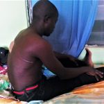 Samuel Wah in hospital bed in Miango, Nigeria. (Morning Star News)
