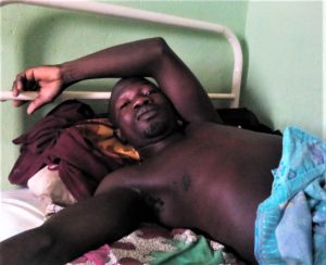 Samuel Wah in hospital in Miango, Nigeria, nearly three months after Muslim Fulani herdsmen shot him. (Morning Star News)