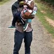 Rohit Oraon with daughter Roshini. (Morning Star News)