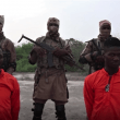 Screen capture from Islamic State’s Amaq news site of Christian aid workers Godfrey Ali Shikagham (left) and Lawrence Duna Dacighir, before their execution by Boko Haram.