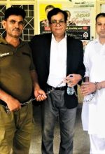 Asif Pervaiz (right) with attorney Saiful Malook (center) at prison. (Morning Star News)