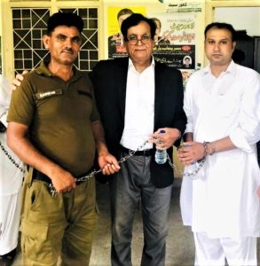 Asif Pervaiz (right) with attorney Saiful Malook (center) at prison. (Morning Star News)