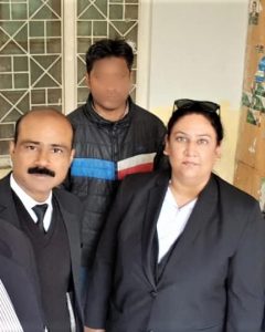 Attorney Aneeqa Maria (right) and accused Christian Haroon Ayub Masih, face obscured for security reasons. (Morning Star News photo courtesy of The Voice Society)
