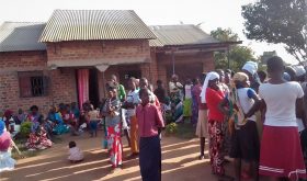 Mourners at the home of the slain Tabiruka Tefiiro in Bupalama village, eastern Uganda. (Morning Star News)