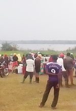 Crowds at Lake Lemwa, Uganda on Sept. 1, 2021 await recovery of the body of Dante Tambika, killed the previous night. (Morning Star News)