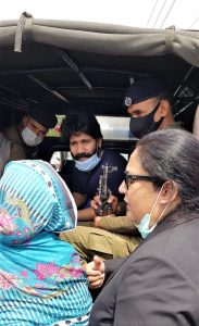 Salamat Mansha Masih (center) sees his mother and former attorney (right) on arrival at jail in Lahore on April 23, 2021. (Morning Star News)