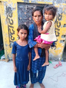 Wife and children of Pastor Bajarang Rawat in Mohanlalganj, Uttar Pradesh, India. (Morning Star News)