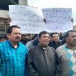 The Rev. Adeem Alphonse (c) and others demand justice after fire at church building in Gujar Khan, Rawalpindi District, Pakistan on March 30, 2024. (Christian Daily International-Morning Star News)