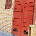 A locked door of a family who fled after being accused of blasphemy in a Christian colony in the Okara district of Pakistan, June 23, 2024. (CDI-MSN)