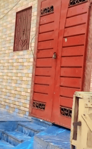 A locked door of a family who fled after being accused of blasphemy in a Christian colony in the Okara district of Pakistan, June 23, 2024. (CDI-MSN)