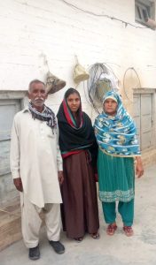 Sana Javed (middle) with parents after rescue from forced conversion and marriage. (Christians' True Spirit)