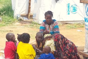 Sudanese family at Gorom Refugee Settlement in South Sudan in July 2023. (Manyang David Mayar, VOA)