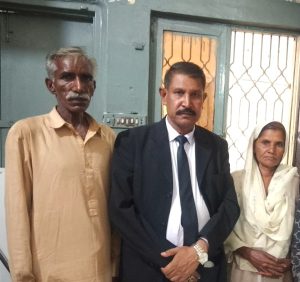 Attorney Hanif Hameed flanked by parents of 15-year-old girl kidnapped and forcibly converted and married in Pakistan. (Christian Daily International-Morning Star News)