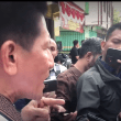 Pastor Herri Soesanto objects to manhandling at sealing of church in Jombang, East Java Province, Indonesia. (Screenshot of YouTube video)