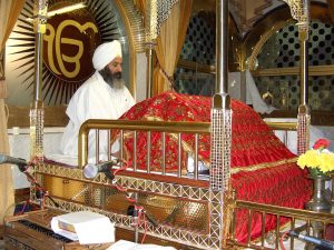 Sikh ceremonial reader reciting from the Guru Granth Sahib. (Hari Singh, Creative Commons)